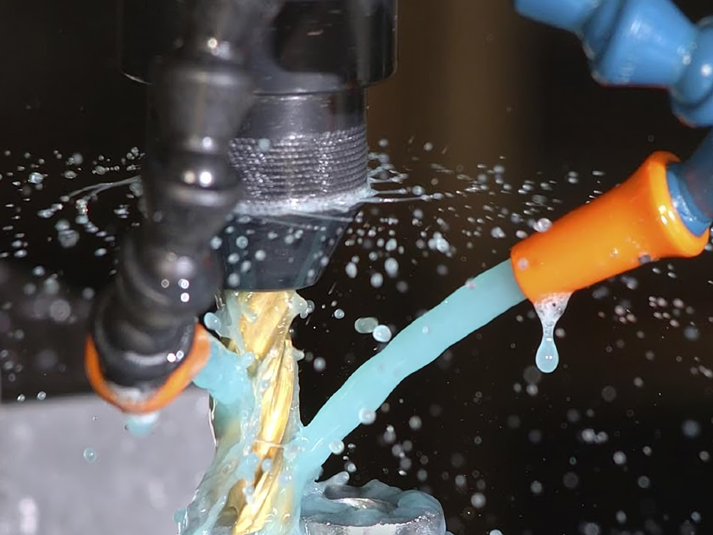Semi-synthetic cutting fluids